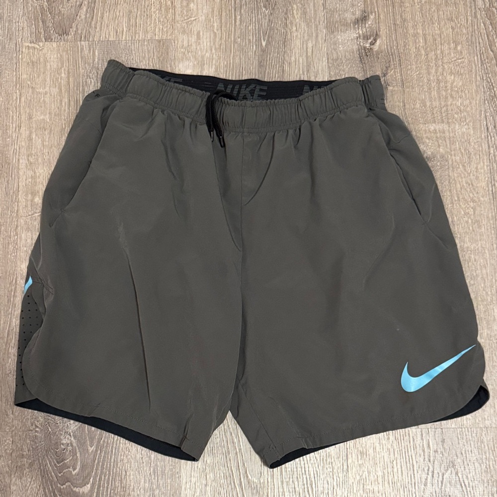 Nike Men's Dark Gray Shorts with Blue Swoosh XL
